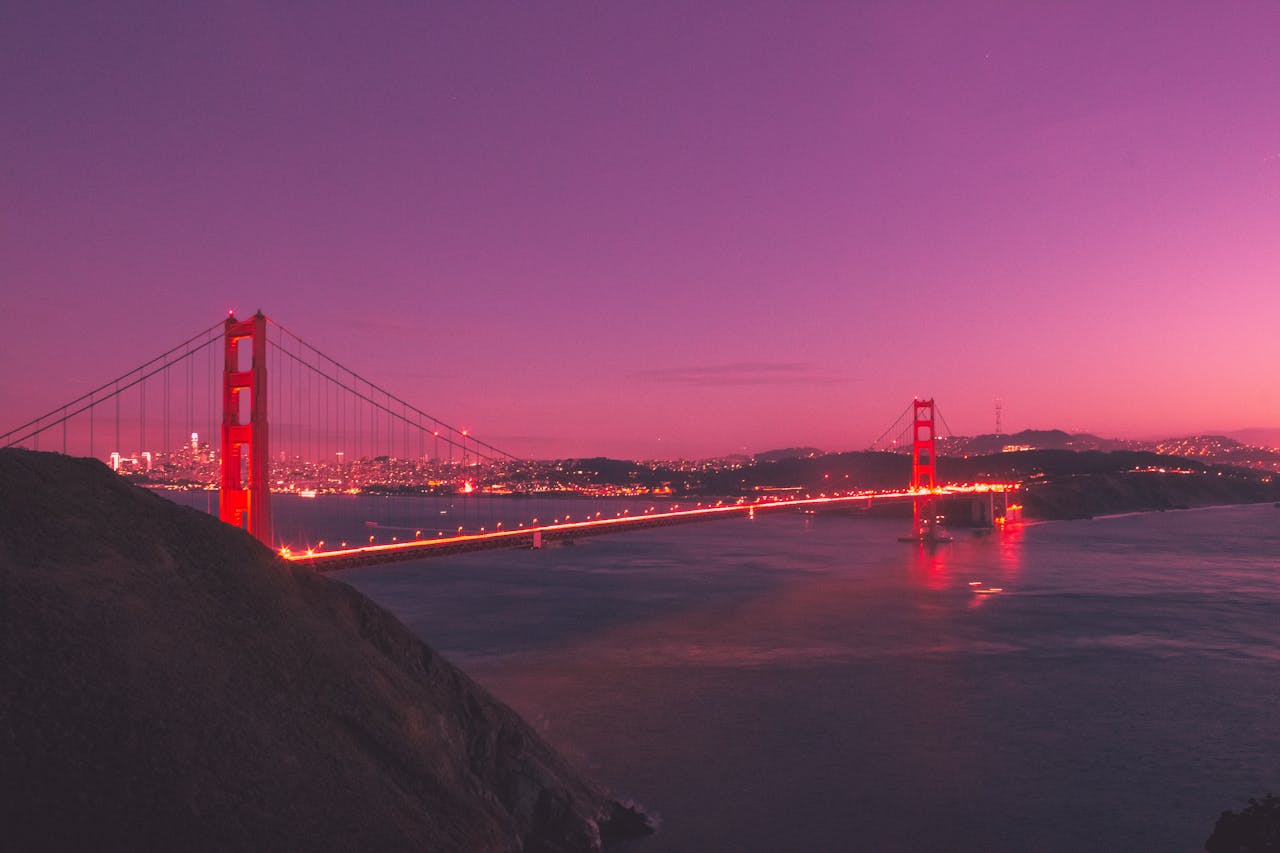 Stunning view of the Golden Gate Bridge at sunset with a vivid sky in San Francisco.